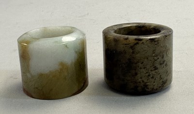 Lot 515 - □ TWO CHINESE JADE ARCHERS RINGS, QING DYNASTY, 19TH CENTURY