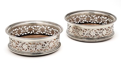 Lot 197 - A PAIR OF GEORGE III SILVER WINE COASTERS, ROBERT & SAMUEL HENNELL, LONDON, 1804