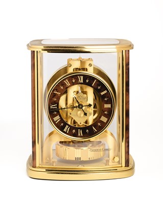 Lot 264 - JAEGER LECOULTRE, ATMOS 'CINTREE', REF.5854: A SWISS GILT-BRASS SKELETON CLOCK, CIRCA 1980