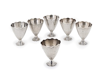 Lot 48 - A SET OF SIX SILVER ZARFS, OTTOMAN EMPIRE OR SUCCESSOR STATES, EARLY 20TH CENTURY