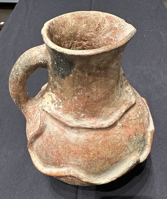 Lot 79 - □ AN ANCIENT PERSIAN TERRACOTTA EWER