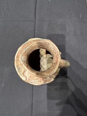 Lot 79 - □ AN ANCIENT PERSIAN TERRACOTTA EWER