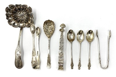 Lot 82 - A GROUP OF EIGHT ASSORTED SILVER TEASPOONS AND SUGAR TONGS