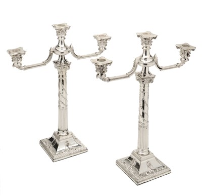 Lot 106 - A PAIR OF ELECTROPLATE THREE-LIGHT CANDELABRA, PROBABLY SHEFFIELD OR BIRMINGHAM, CIRCA 1900