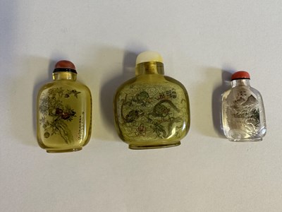 Lot 84 - THREE CHINESE INSIDE-PAINTED CLEAR GLASS SNUFF BOTTLES