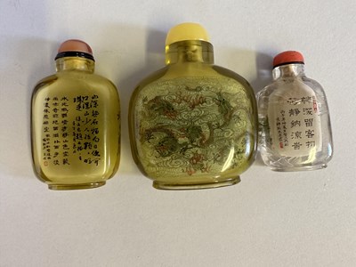 Lot 84 - THREE CHINESE INSIDE-PAINTED CLEAR GLASS SNUFF BOTTLES