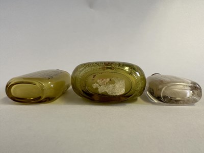 Lot 84 - THREE CHINESE INSIDE-PAINTED CLEAR GLASS SNUFF BOTTLES