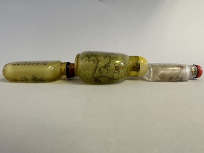 Lot 84 - THREE CHINESE INSIDE-PAINTED CLEAR GLASS SNUFF BOTTLES