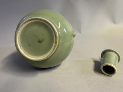 Lot 7 - A CHINESE CELADON-GLAZED EWER AND COVER