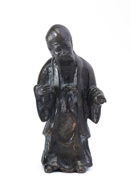 Lot 38 - A SMALL CHINESE BRONZE FIGURE OF SHOU LAO, QING DYNASTY, 17TH/18TH CENTURY