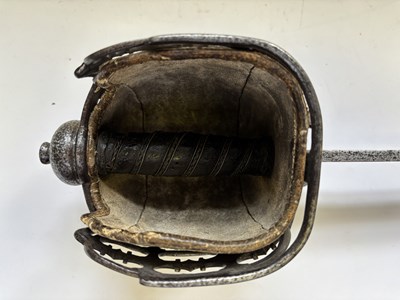 Lot 125 - A HIGHLAND BASKET-HILTED BACKSWORD, SECOND HALF OF THE 18TH CENTURY