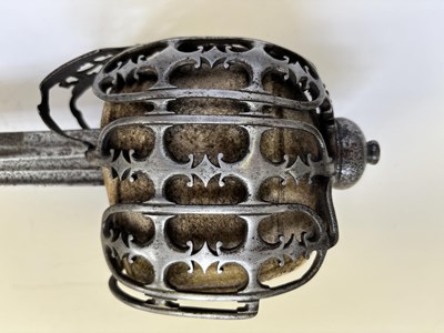 Lot 125 - A HIGHLAND BASKET-HILTED BACKSWORD, SECOND HALF OF THE 18TH CENTURY