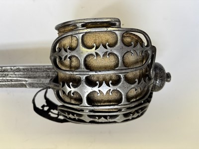 Lot 125 - A HIGHLAND BASKET-HILTED BACKSWORD, SECOND HALF OF THE 18TH CENTURY