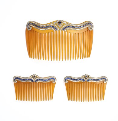 Lot 204 - A SET OF THREE BELLE EPOQUE  BLOND TORTOISESHELL, SAPPHIRE AND DIAMOND HAIR COMBS, CIRCA 1910