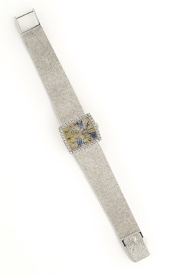 Lot 309 - PATEK PHILIPPE, REF.3353/1: A LADY'S DIAMOND-SET WHITE GOLD BRACELET WATCH, CIRCA 1972