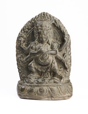 Lot 149 - A SMALL GREY STONE RELIEF DEPICTING MAHAKALA, NEPAL, 16TH/17TH CENTURY