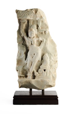 Lot 159 - A LIMESTONE FRAGMENT PROBABLY DEPICTING THE BIRTH OF BUDDHA, EASTERN DECCAN, 1ST/2ND CENTURY A.D.