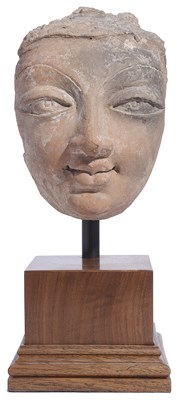 Lot 162 - A TERRACOTTA HEAD, PROBABLY OF BUDDHA, KASHMIR, 6TH/7TH CENTURY