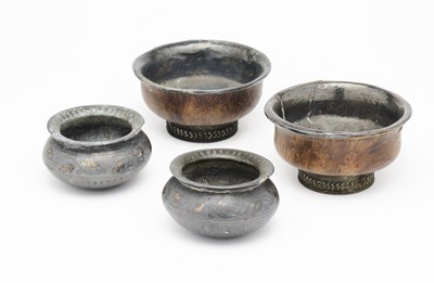 Lot 538 - TWO SHEET SILVER MOUNTED WOOD TEABOWLS, TIBET, CIRCA 1900