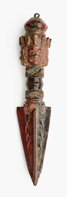 Lot 137 - A CARVED AND PAINTED WOOD RITUAL DAGGER (PHURBU), TIBET, 19TH CENTURY