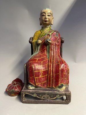 Lot 103 - A RARE CHINESE ENAMELLED LEAD FIGURE OF A PRIEST, QING DYNASTY, 18TH CENTURY