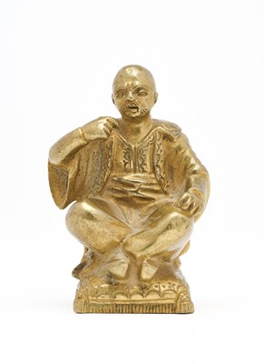 Lot 35 - A CHINESE GILT-BRONZE FIGURE OF A LUOHAN, QING DYNASTY, 18TH CENTURY