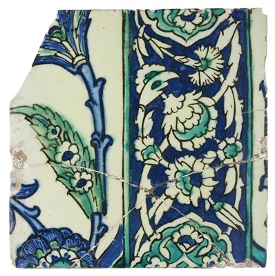 Lot 84 - A FRAGMENTARY IZNIK TILE, OTTOMAN ANATOLIA, 17TH CENTURY