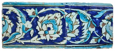 Lot 80 - AN IZNIK BORDER TILE, OTTOMAN ANATOLIA, 17TH CENTURY