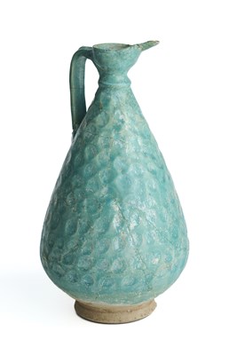 Lot 61 - A KASHAN TURQUOISE GLAZED EWER, PERSIA, CIRCA 12TH CENTURY