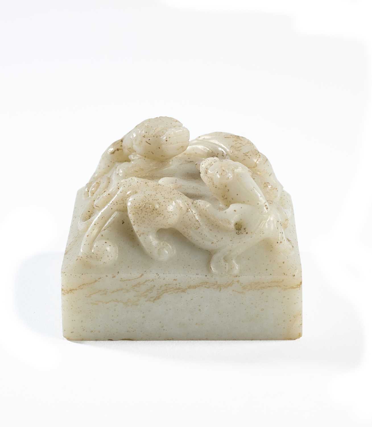 Lot 6 - A CHINESE CARVED WHITE JADE 'CHILONG' SEAL, QING DYNASTY, 19TH CENTURY