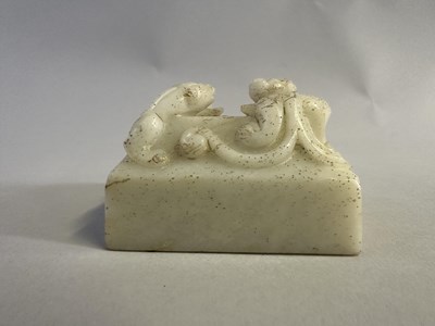 Lot 6 - A CHINESE CARVED WHITE JADE 'CHILONG' SEAL, QING DYNASTY, 19TH CENTURY