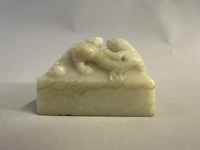 Lot 6 - A CHINESE CARVED WHITE JADE 'CHILONG' SEAL, QING DYNASTY, 19TH CENTURY