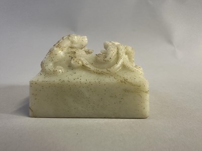 Lot 6 - A CHINESE CARVED WHITE JADE 'CHILONG' SEAL, QING DYNASTY, 19TH CENTURY