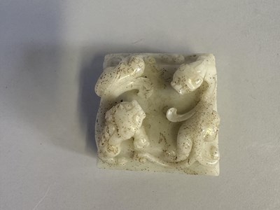 Lot 6 - A CHINESE CARVED WHITE JADE 'CHILONG' SEAL, QING DYNASTY, 19TH CENTURY