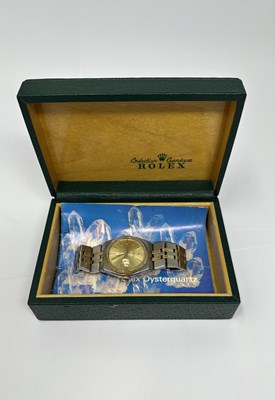 Lot 527 - ROLEX, OYSTERQUARTZ DATEJUST, REF.17013: GENTLEMAN'S GOLD AND STAINLESS STEEL BRACELET WATCH, CIRCA 1978