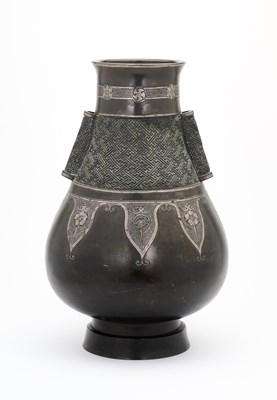 Lot 33 - A CHINESE ARCHAISTIC GOLD AND SILVER-INLAID BRONZE VASE, HU, QING DYNASTY, 19TH CENTURY