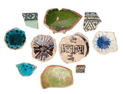 Lot 72 - A COLLECTION OF EARLY ISLAMIC POTSHERDS, PERSIA AND SYRIA, 12TH-14TH CENTURIES