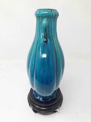 Lot 23 - A CHINESE TURQUOISE-GLAZED MOON FLASK^ 19TH /...