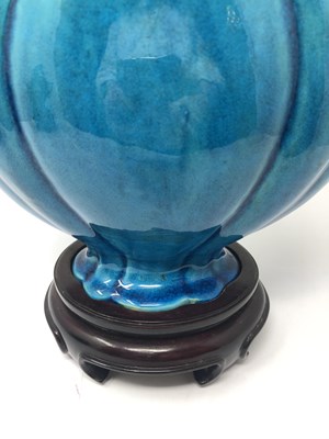 Lot 23 - A CHINESE TURQUOISE-GLAZED MOON FLASK^ 19TH /...