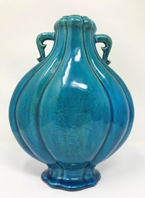 Lot 23 - A CHINESE TURQUOISE-GLAZED MOON FLASK^ 19TH /...