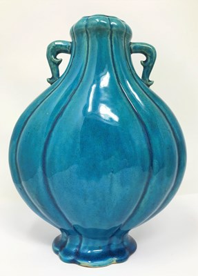 Lot 23 - A CHINESE TURQUOISE-GLAZED MOON FLASK^ 19TH /...