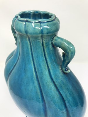 Lot 23 - A CHINESE TURQUOISE-GLAZED MOON FLASK^ 19TH /...