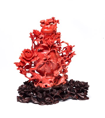 Lot 62 - ˜A CHINESE CARVED AND PIERCED CORAL VASE AND...