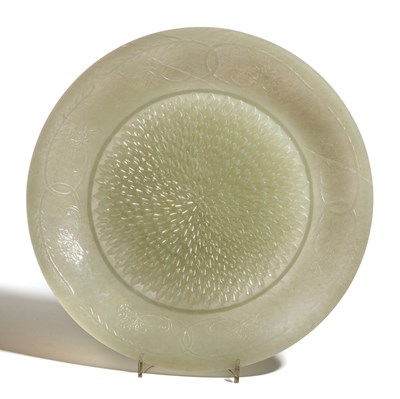 Lot 68 - A CHINESE CARVED JADEITE DISH^ 20TH...