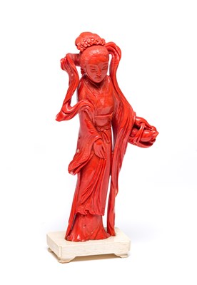 Lot 73 - ˜A CHINESE CARVED CORAL FIGURE OF A MAIDEN^...