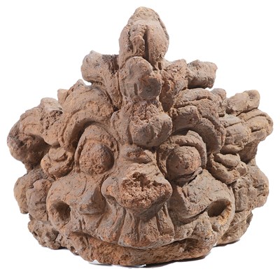 Lot 90 - A JAVANESE TERRACOTTA CORNER ANTEFIX^...