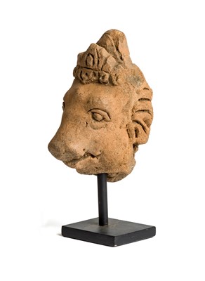 Lot 95 - A MAJAPAHIT FRAGMENTARY TERRACOTTA HEAD OF...