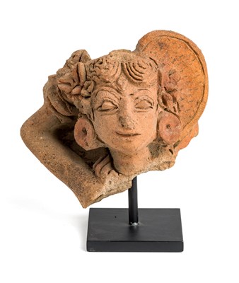 Lot 102 - A MAJAPAHIT TERRACOTTA FRAGMENTARY BUST OF A...