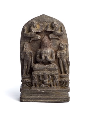 Lot 143 - A SMALL BLACK STONE PLAQUE DEPICTING BUDDHA^...