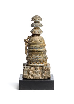 Lot 147 - A GANDHARA GREY SCHIST MINIATURE STUPA^...